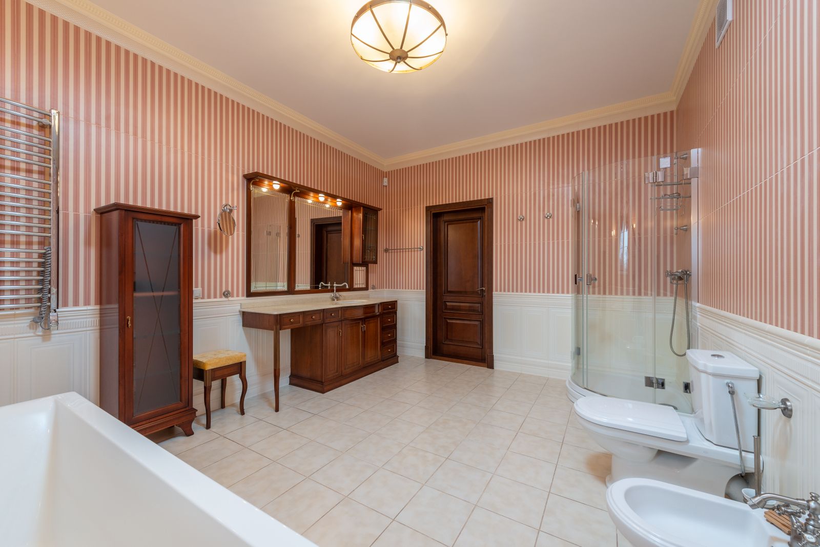 Accessible bathrooms. Zero threshold, blocked walls, a bench you would sit on anyway.